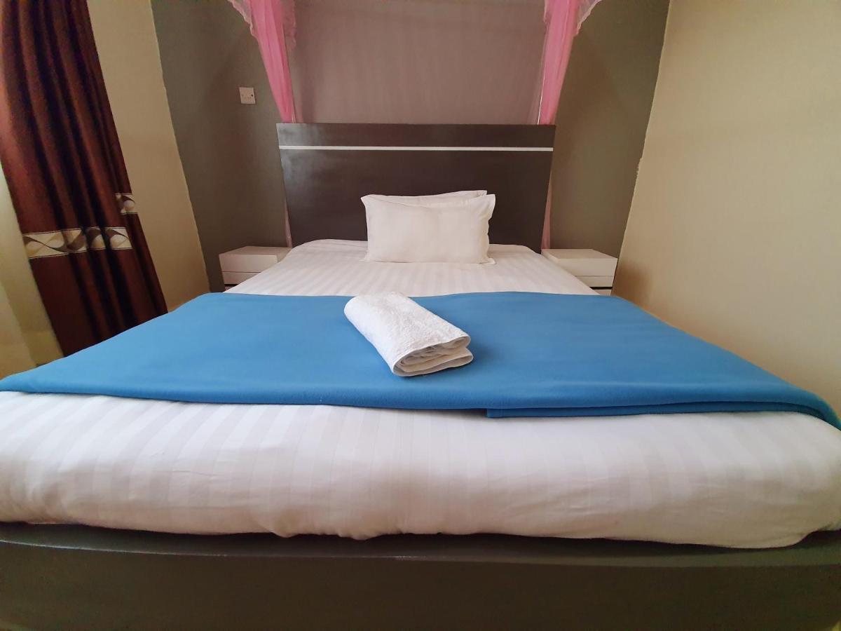 Airport Unique Hotel Entebbe Buitenkant foto