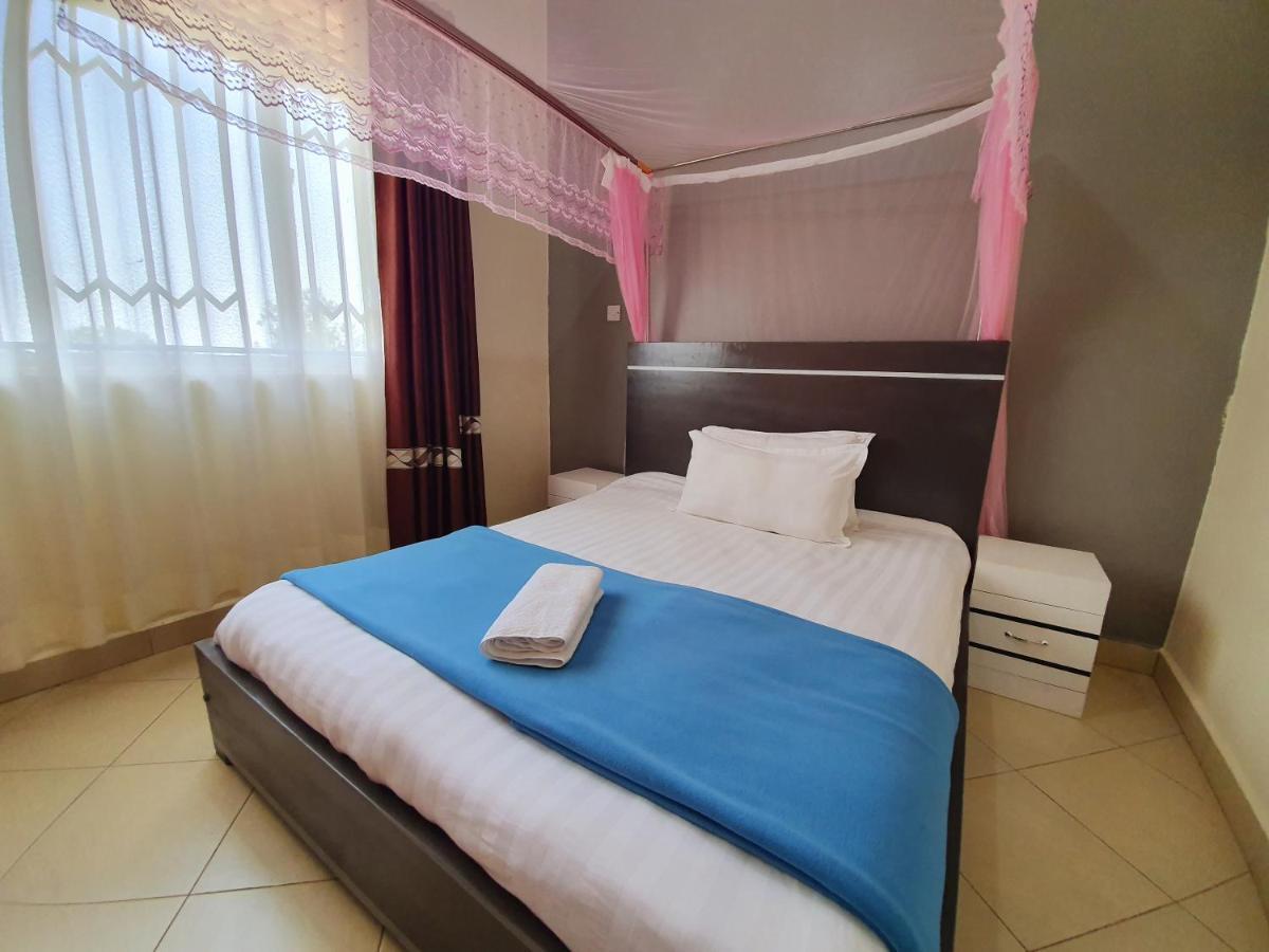 Airport Unique Hotel Entebbe Buitenkant foto
